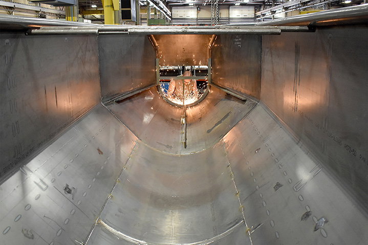 Concrete surge hoppers &mdash; 5,000 lb steel weldment, 50+ components, Milwaukee fabrication