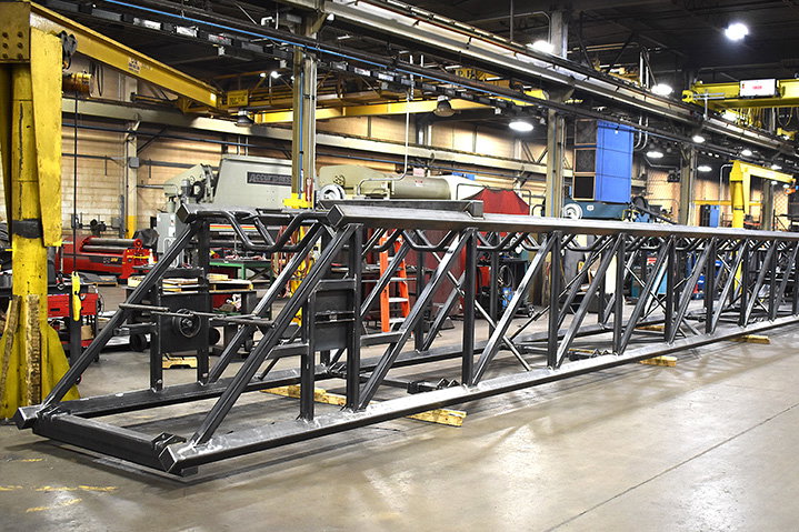 Telescopic conveyor system &mdash; 800 welded steel components, 30,000 lb, 150 ft extended